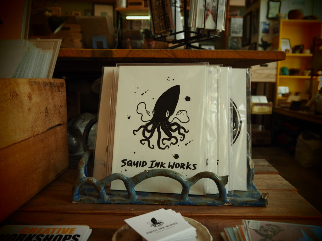 Materiały reklamowe galerii Squid Ink Works
